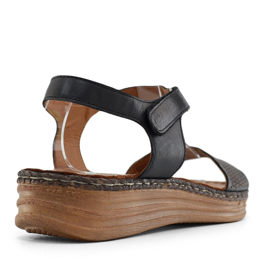BACK VIEW OF BLACK LEATHER SANDAL WITH STRAP
