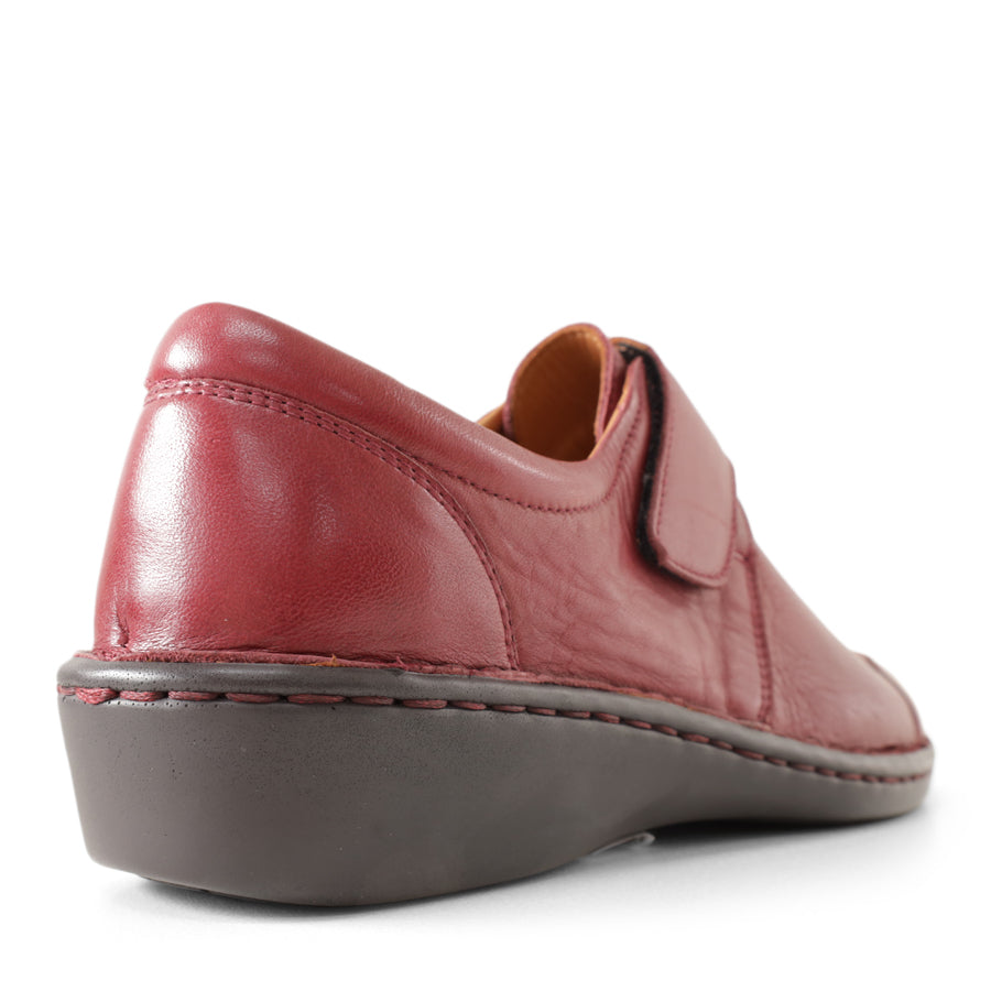 BACK VIEW OF RED LEATHER CASUAL SHOE WITH VELCRO STRAP 