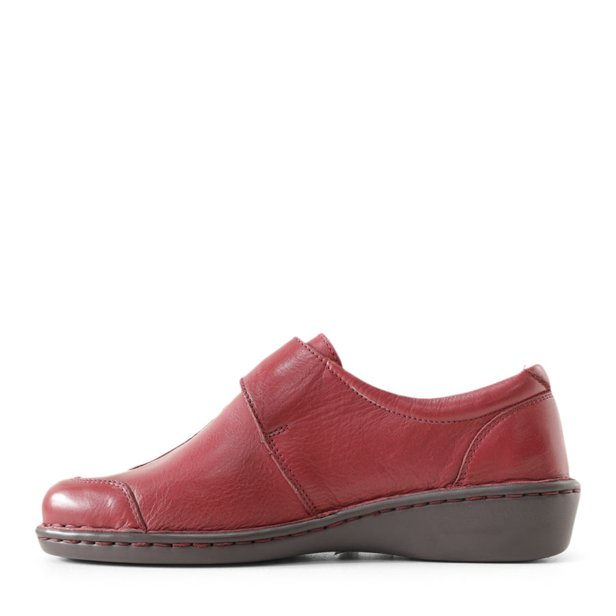 SIDE VIEW OF RED LEATHER CASUAL SHOE WITH VELCRO STRAP 