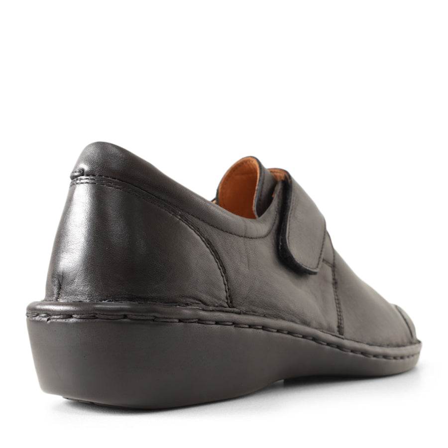 BACK VIEW OF BLACK LEATHER CASUAL SHOE WITH VELCRO STRAP 