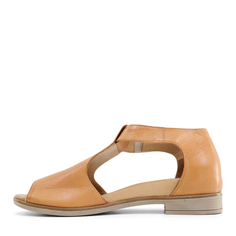 SIDE VIEW OF TAN LEATHER T BAR SANDAL WITH VELCRO STRAP 