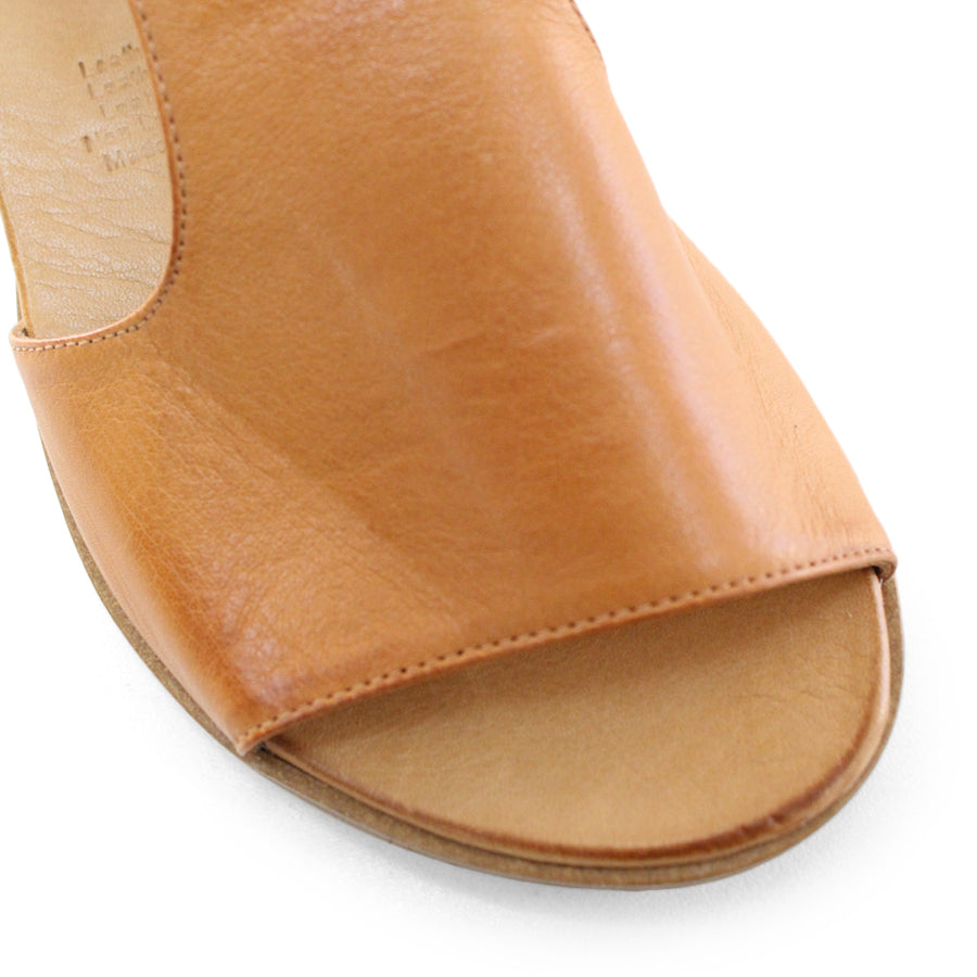 FRONT VIEW OF TAN LEATHER T BAR SANDAL WITH VELCRO STRAP 