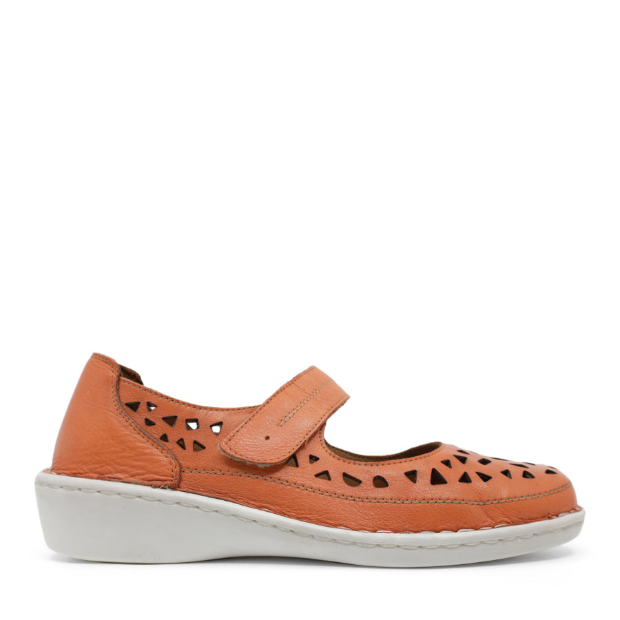 SIDE VIEW OF ORANGE LEATHER CASUAL SHOE WITH VELCRO STRAP AND WHITE SOLE