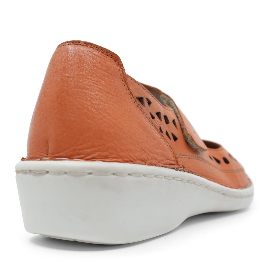 BACK VIEW OF ORANGE LEATHER CASUAL SHOE WITH VELCRO STRAP AND WHITE SOLE