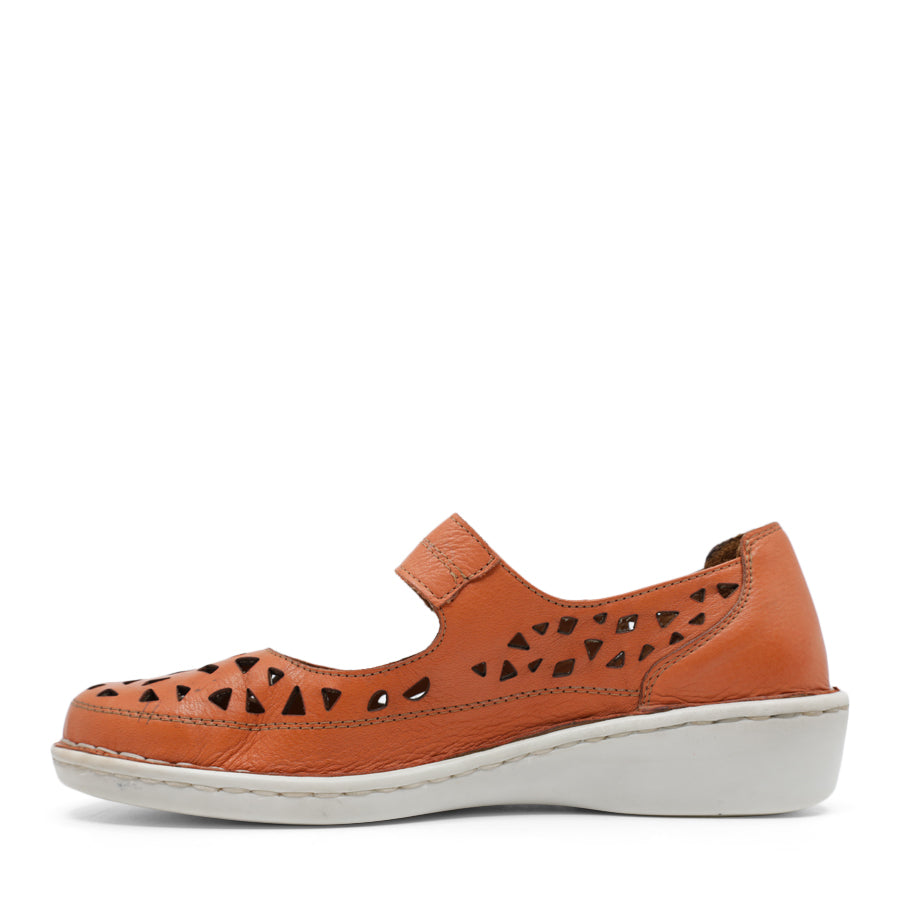 SIDE VIEW OF ORANGE LEATHER CASUAL SHOE WITH VELCRO STRAP AND WHITE SOLE
