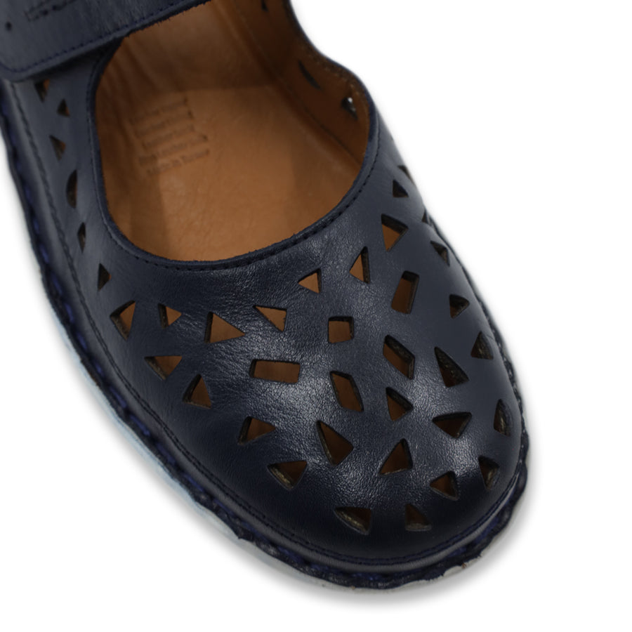 FRONT VIEW OF NAVY LEATHER CASUAL SHOE WITH CUTOUTS WITH VELCRO STRAP AND WHITE SOLE