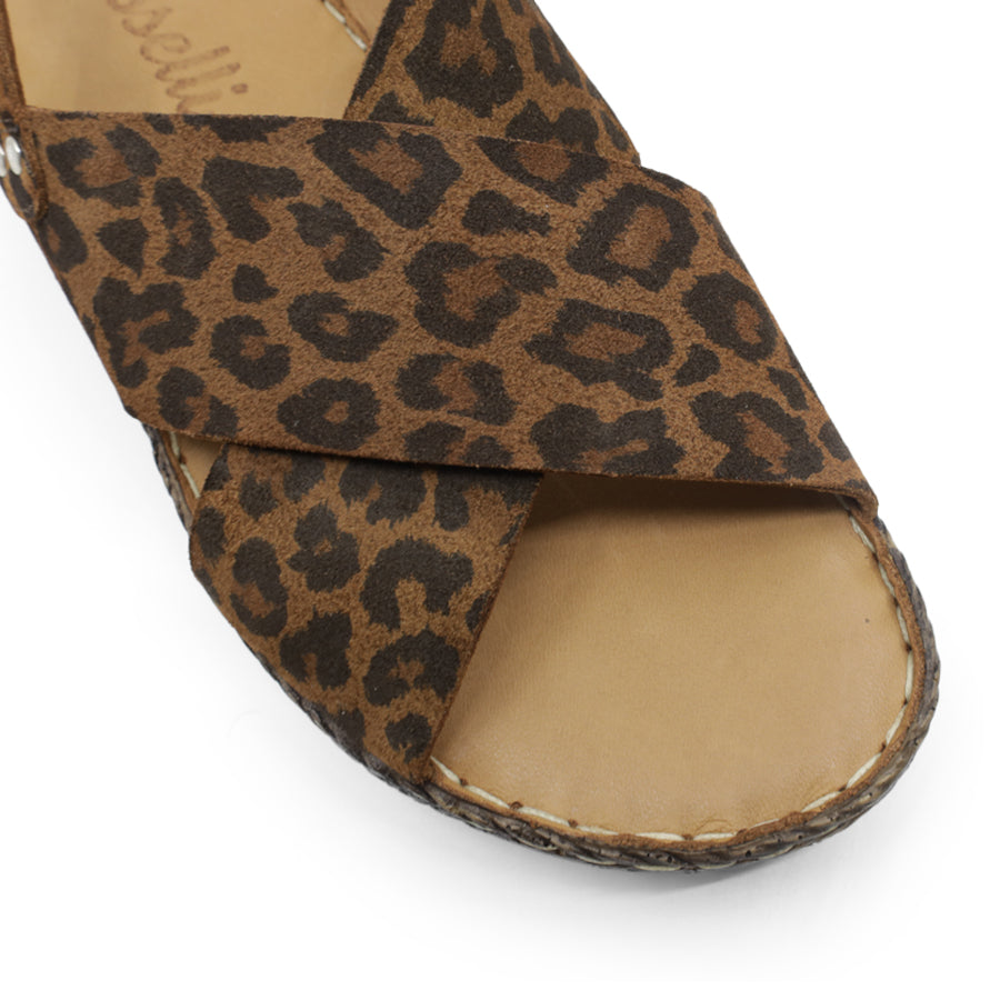 SIDE VIEW OF LEOPARD LEATHER CRISS CROSS FRONT SANDAL 