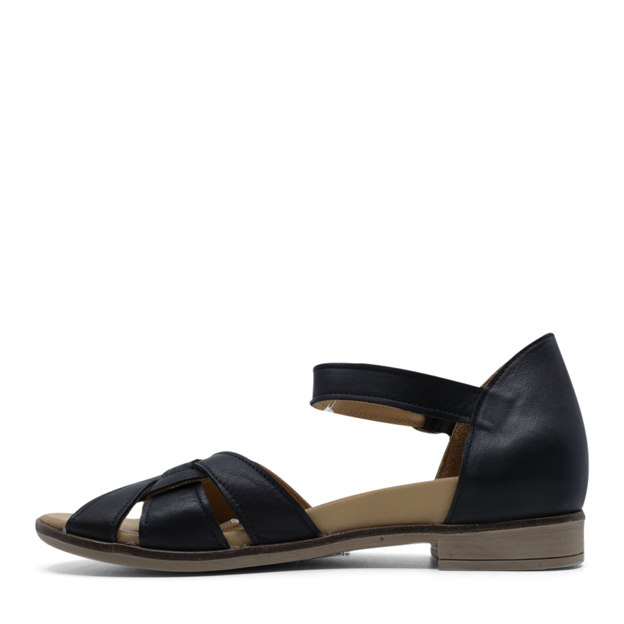 SIDE VIEW OF BLACK LEATHER SANDAL WITH INTERWOVEN POCKED BACK FRONT AND ADJUSTABLE BUCKLE