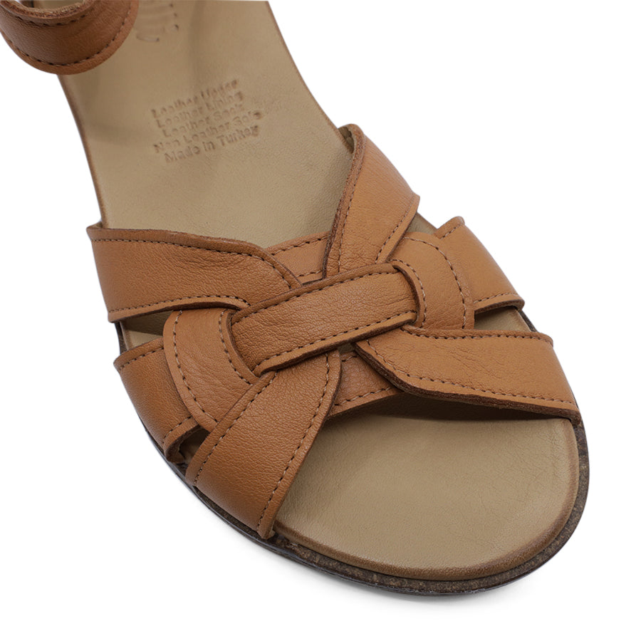 FRONT VIEW OF TAN LEATHER SANDAL WITH INTERWOVEN POCKED BACK FRONT
