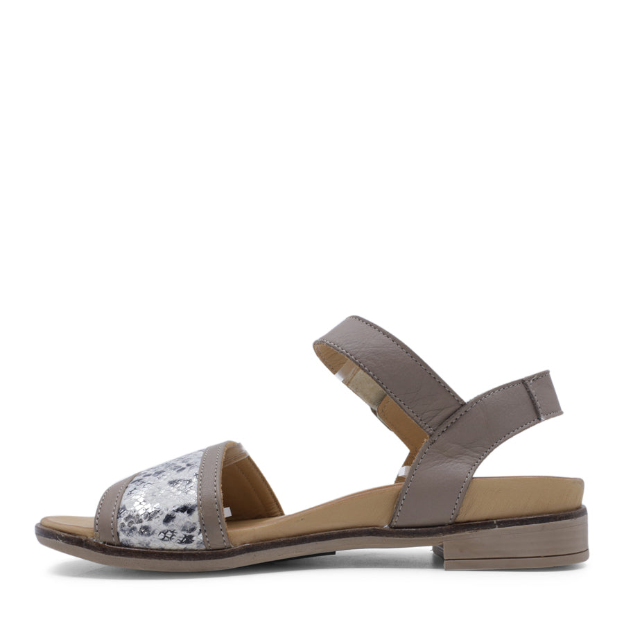SIDE VIEW OF GREY LEATHER SANDAL WITH SNAKE PRINT DETAIL AND ADJUSTABLE BUCKLE
