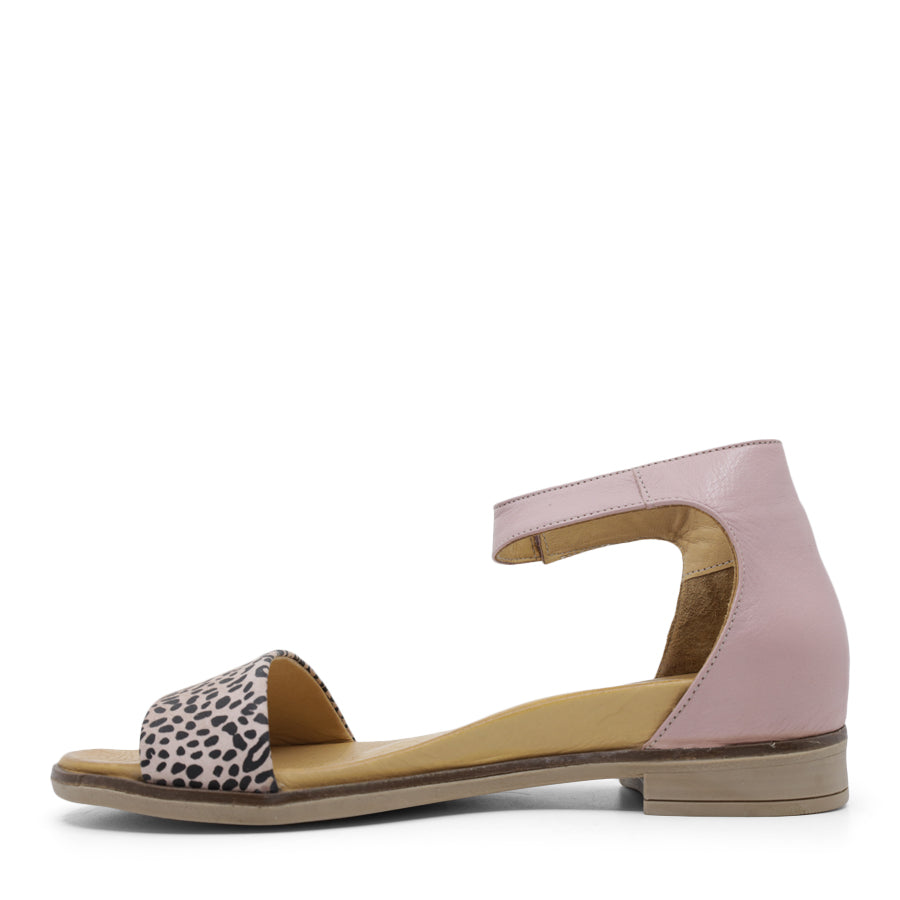 SIDE VIEW OF PINK LEATHER SANDAL WITH LEOPARD PRINT DETAIL ON FRONT AND VELCRO STRAP TO SECURE 