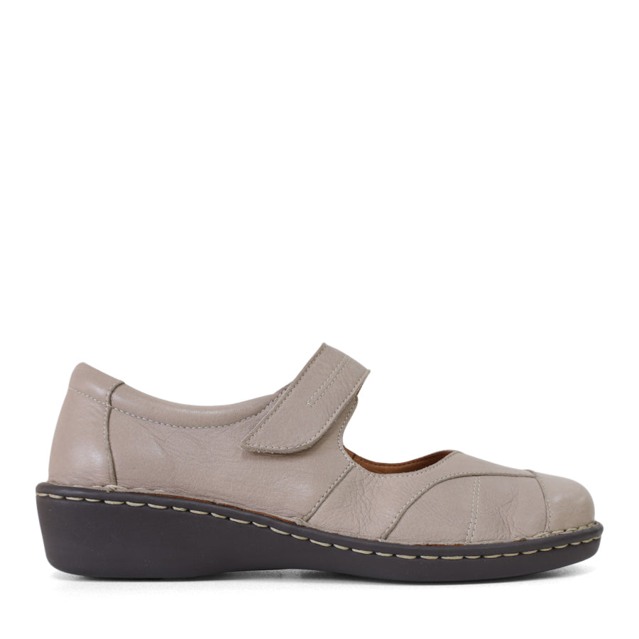 SIDE VIEW OF GREY LEATHER FLAT CASUAL SHOW WITH VELCRO CLOSURE