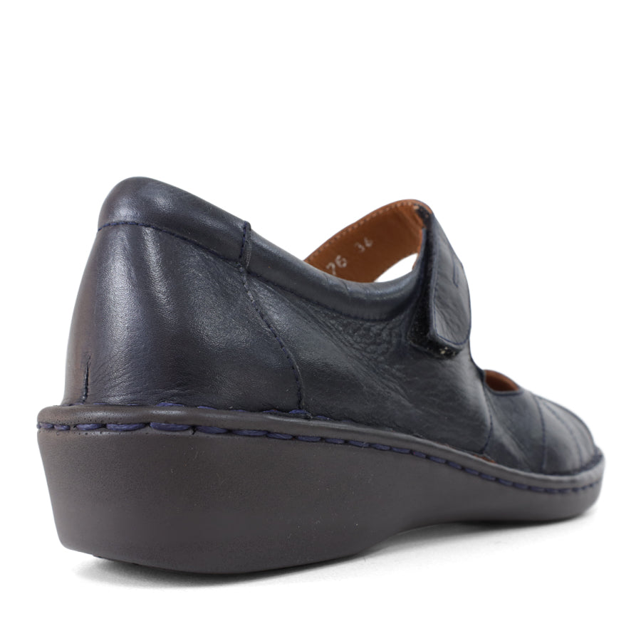 BACK VIEW OF BLUE LEATHER FLAT CASUAL SHOW WITH VELCRO CLOSURE