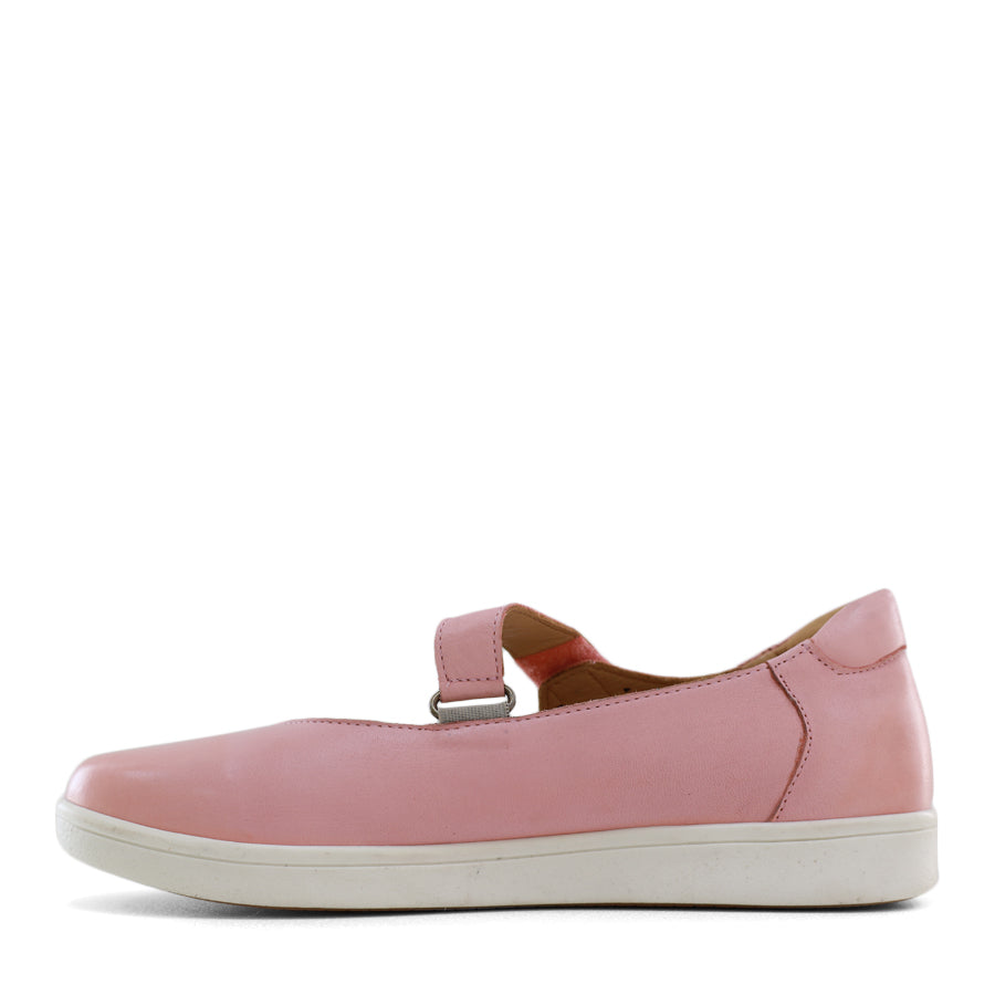 SIDE VIEW OF PINK CASUAL SHOE WITH VELCRO STRAP AND SPECKLE CUT OUT DETAILING ON THE SIDES 