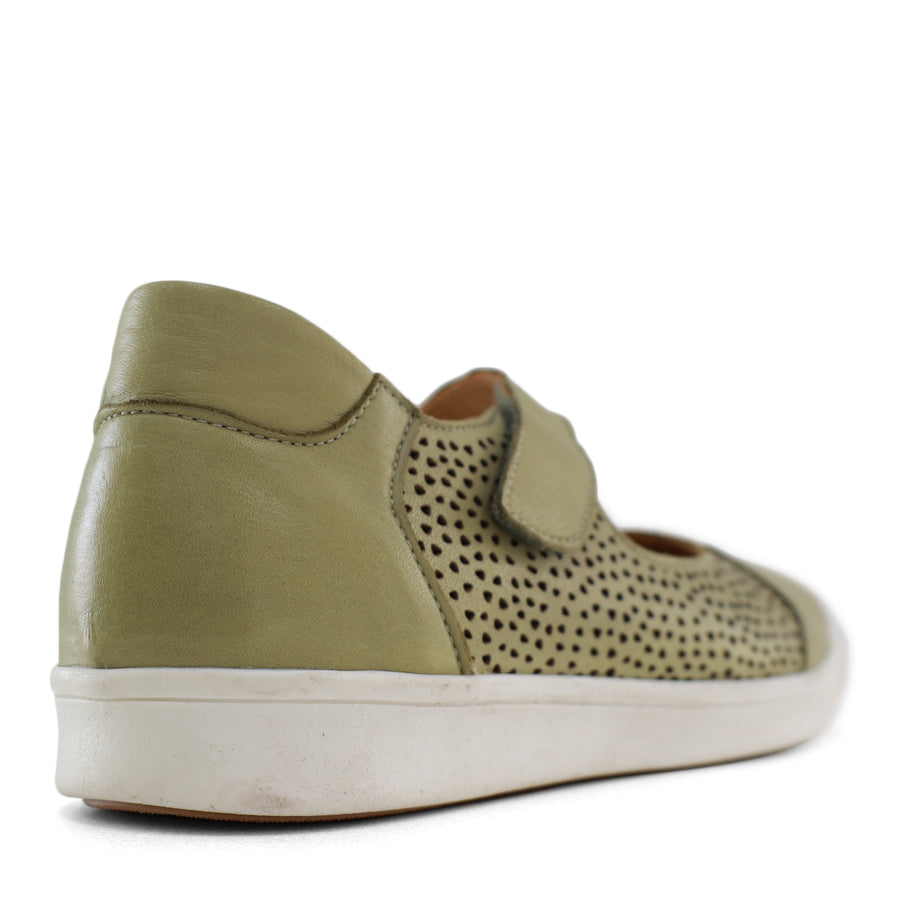 BACK VIEW OF GREEN CASUAL SHOE WITH VELCRO STRAP AND SPECKLE CUT OUT DETAILING ON THE SIDES 
