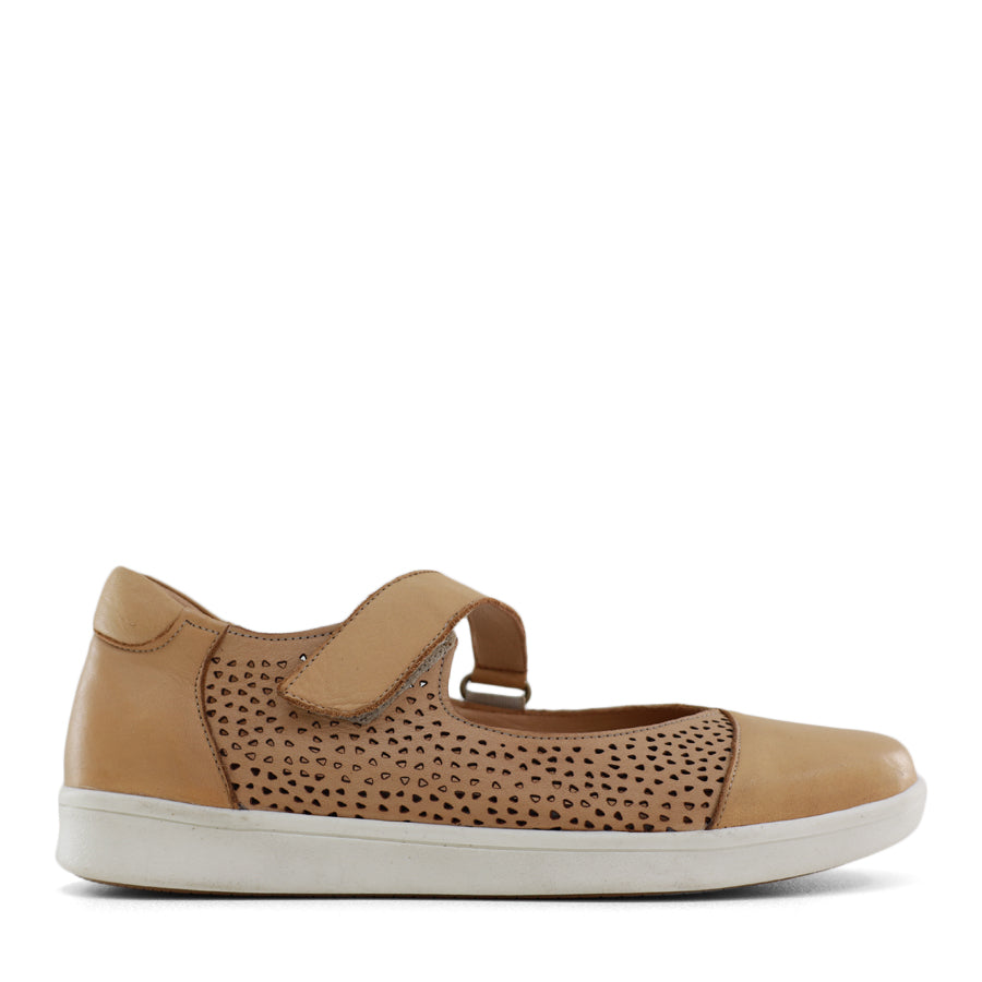  SIDE VIEW OF TAN CASUAL SHOE WITH VELCRO STRAP AND SPECKLE CUT OUT DETAILING ON THE SIDES 