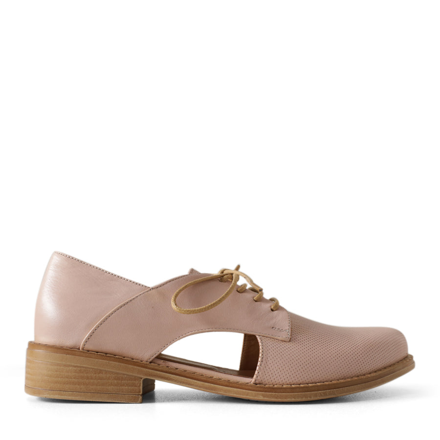 SIDE VIEW PINK LACE UP FLAT WITH CUT OUT DETAILING ON THE SIDES. 