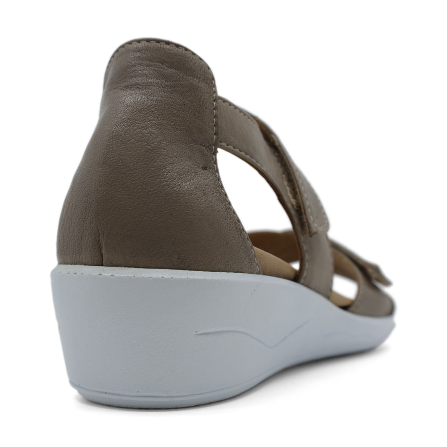 BACK VIEW OF GREY OPEN TOE SANDAL WITH TWO VELCRO STRAPS AND WHITE SOLE