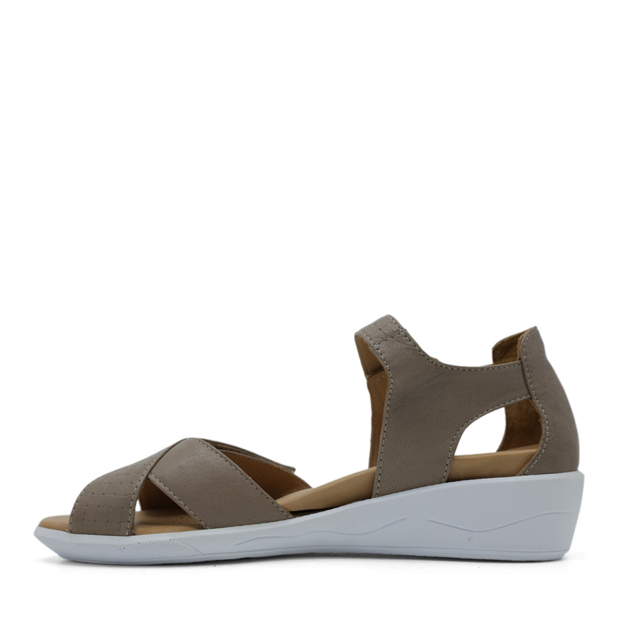 SIDE VIEW OF GREY OPEN TOE SANDAL WITH TWO VELCRO STRAPS AND WHITE SOLE