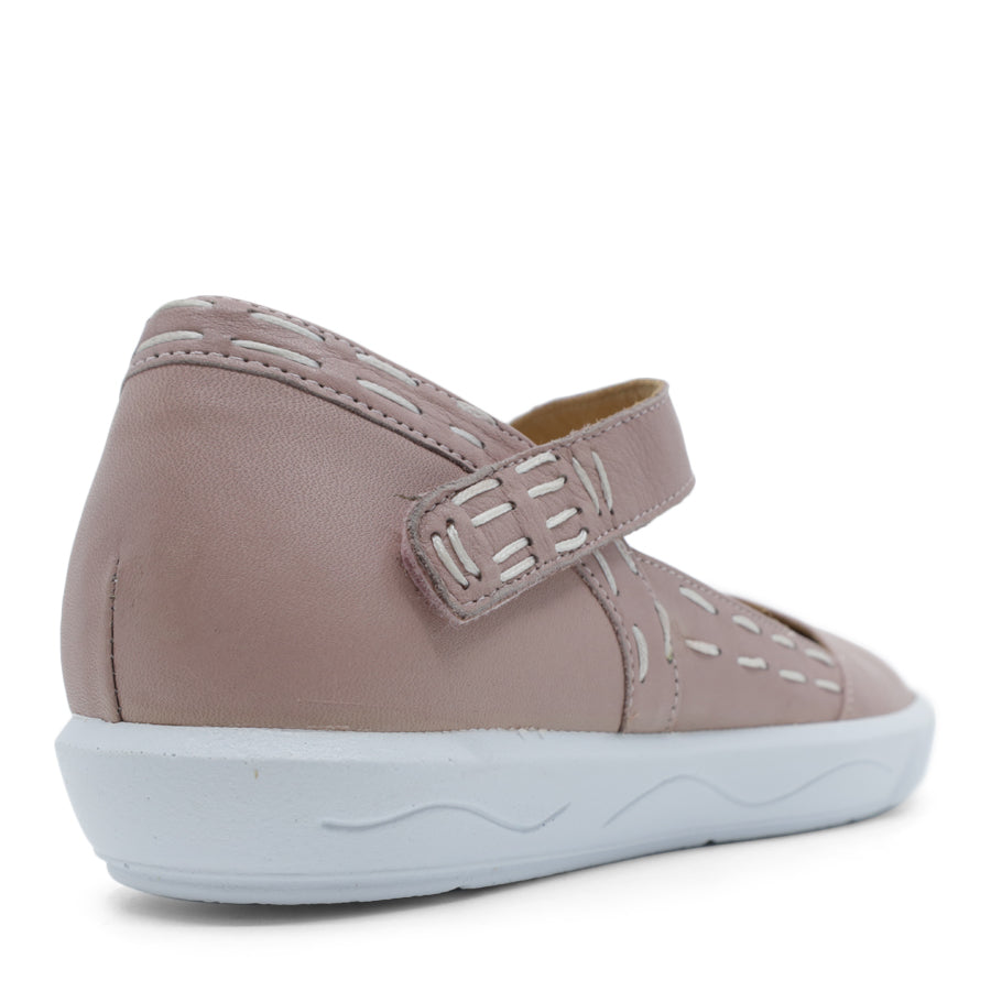 BACK VIEW OF PINK CASUAL SHOE WITH STRAP, WHITE STITCH DETAIL AND WHITE SOLE 