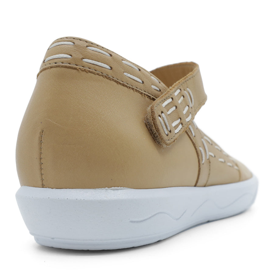 BACK VIEW OF BEIGE CASUAL SHOE WITH STRAP, WHITE STITCH DETAIL AND WHITE SOLE 