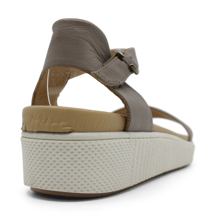 BACK VIEW OF GREY SANDAL WITH BUCKLE AND WHITE SOLE 