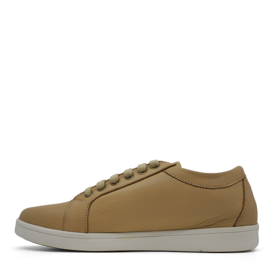 SIDE VIEW OF TAN LACE UP SNEAKER WITH SIDE ZIP AND WHITE SOLE 
