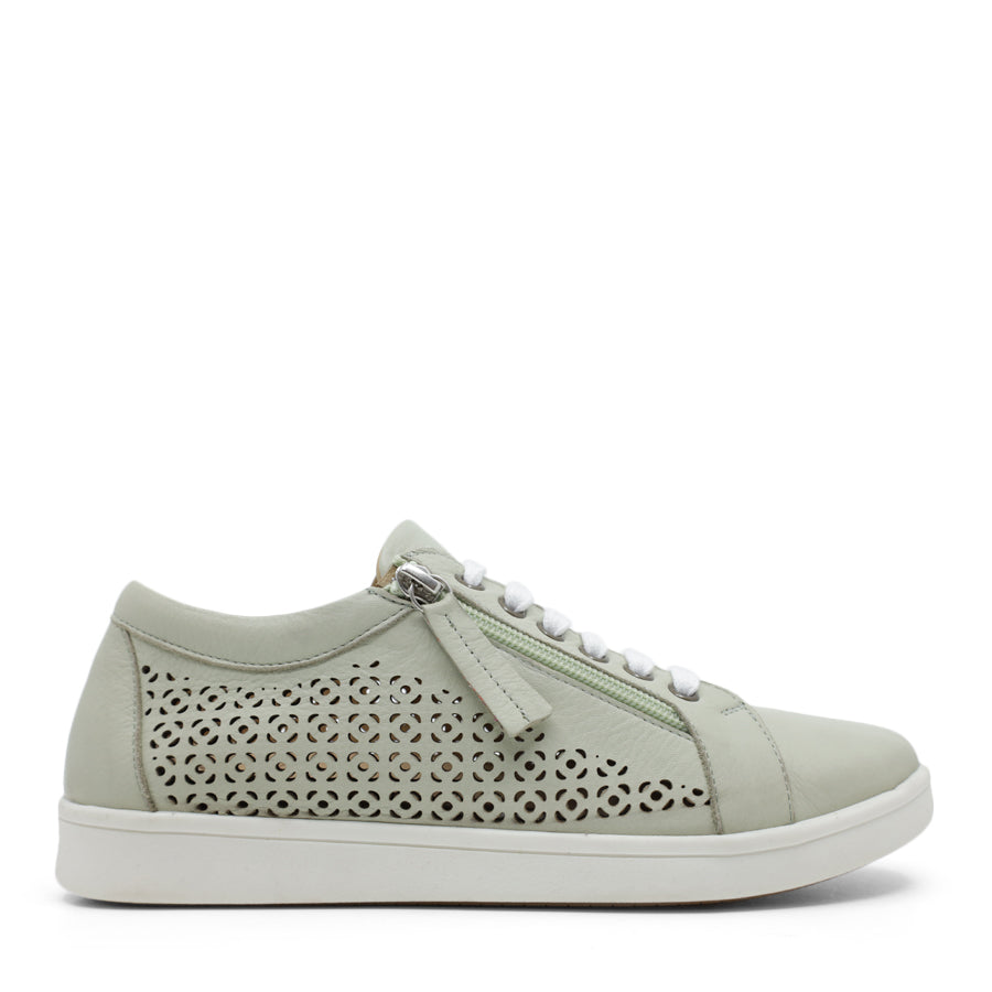 SIDE VIEW OF WHITE LACE UP SNEAKER WITH SIDE ZIP AND WHITE SOLE. PERFORATED DETAIL ON SIDE PANELS 