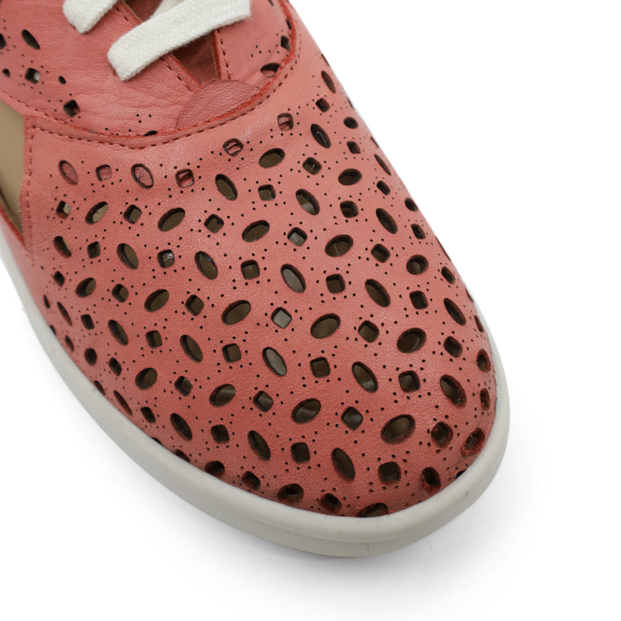 FRONT VIEW OF PINK LACE UP CASUAL SHOE WITH SPECKLE CUT OUT DETAILING 
