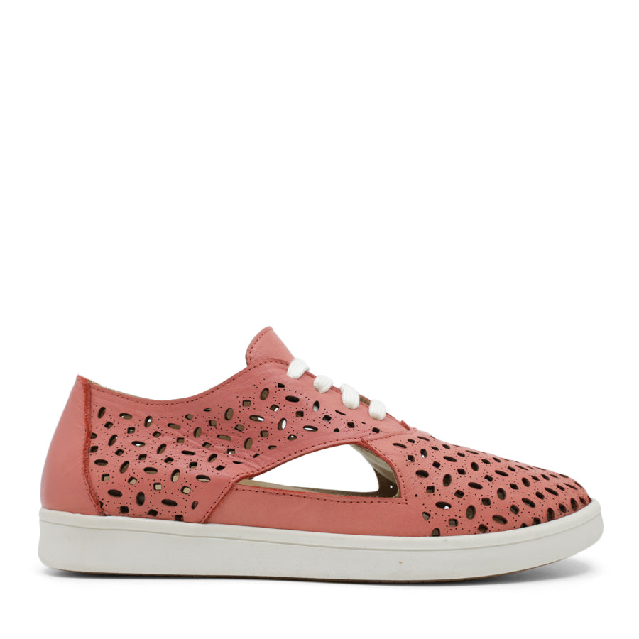 SIDE VIEW OF PINK LACE UP CASUAL SHOE WITH SPECKLE CUT OUT DETAILING 