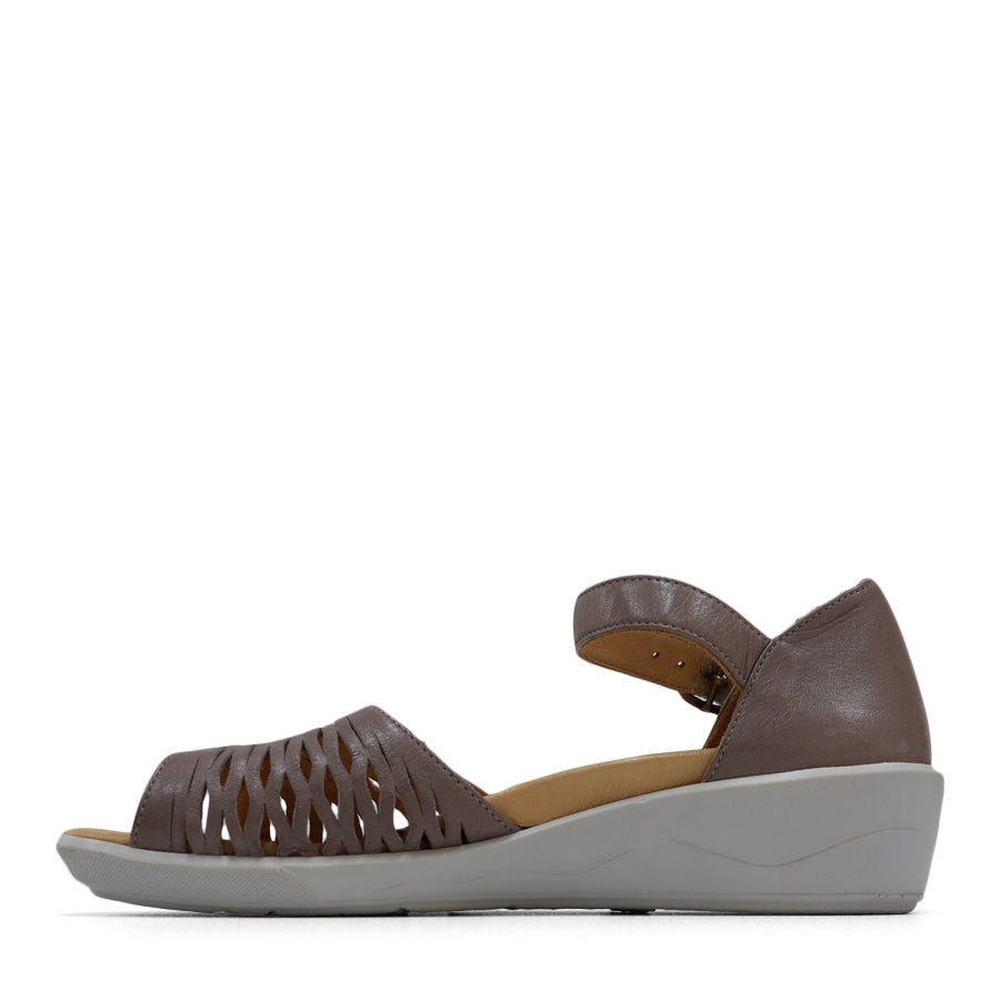 SIDE VIEW OF GREY SANDAL WITH WHITE SOLE AND ADJUSTABLE BUCKLE 