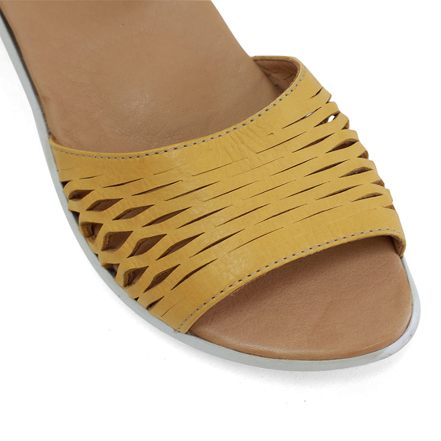 FRONT VIEW OF YELLOW SANDAL WITH WHITE SOLE AND ADJUSTABLE BUCKLE 