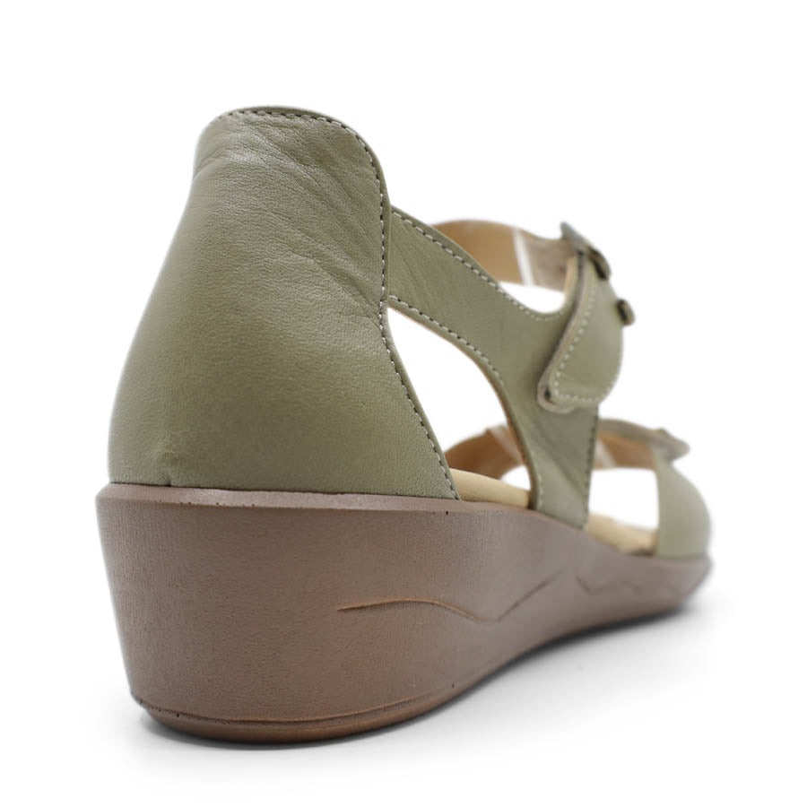 BACK VIEW OF GREEN DUAL VELCRO CLOSED BACK SANDAL WITH DECORATIVE BUCKLE 