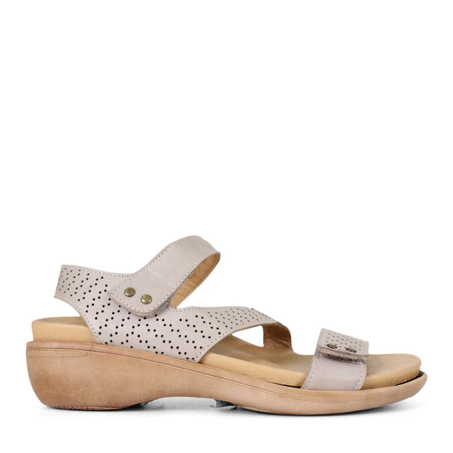 SIDE VIEW OF GREY SANDAL WITH 3 ADJUSTABLE STRAPS AND PERFORATED DETAILLING 